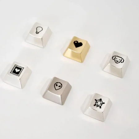 Apple designer Susan Kare unveils NFT “Esc Keys” at Asprey Studio